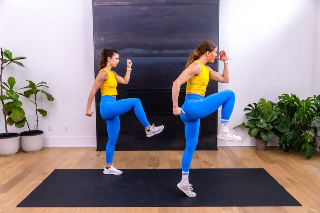 Two women performing high knees as part of a bone-strengthening workout.