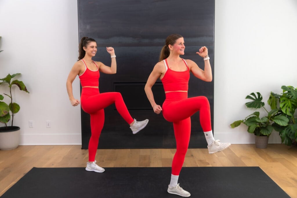 Two women doing high knees