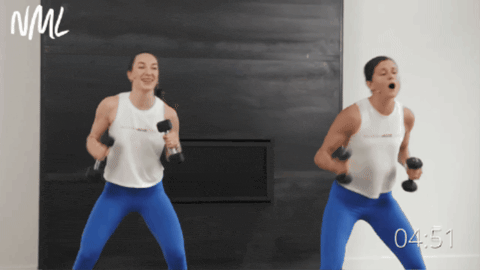 Two woman working out doing jab and hooks.