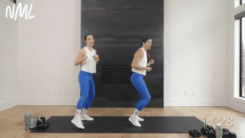 Two woman working out doing jab cross hook uppers.