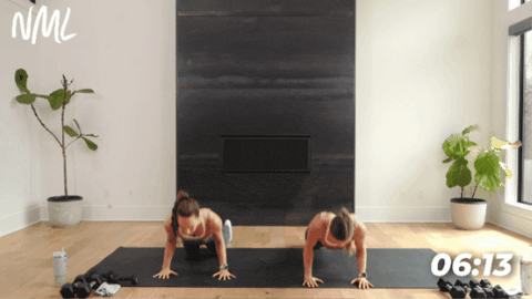 two women doing push ups